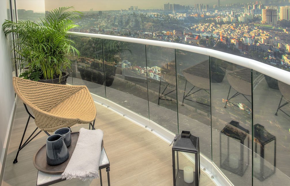 a terrace with a chair in it to relax