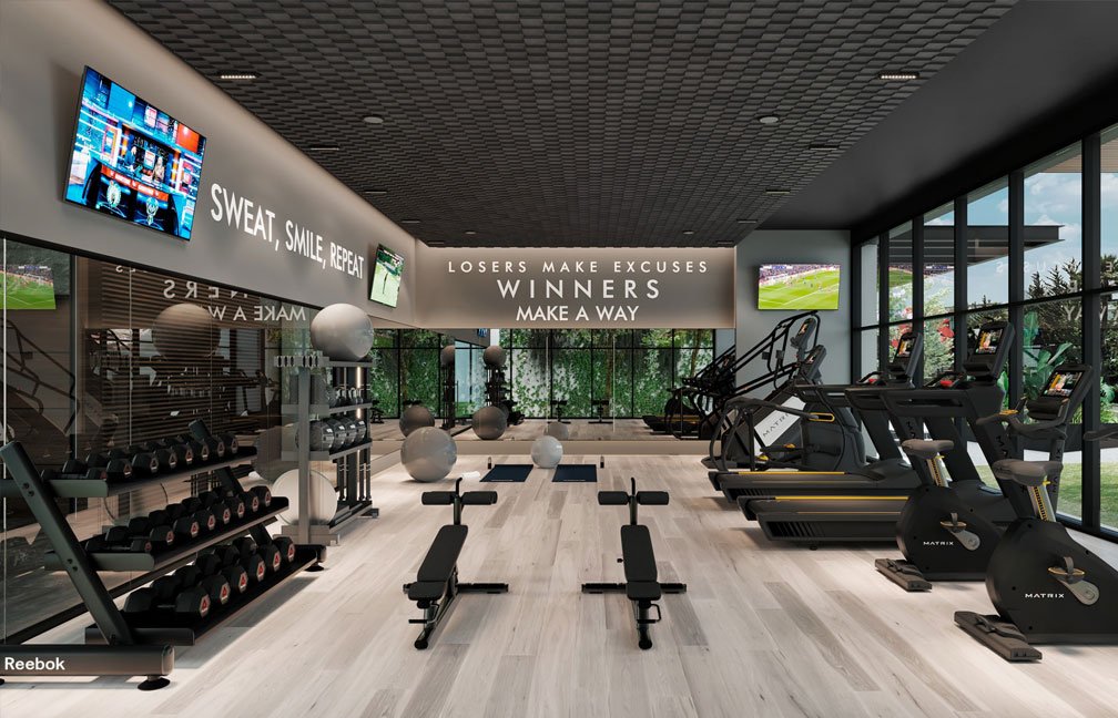área de gimnasio con equipos de gimnasio